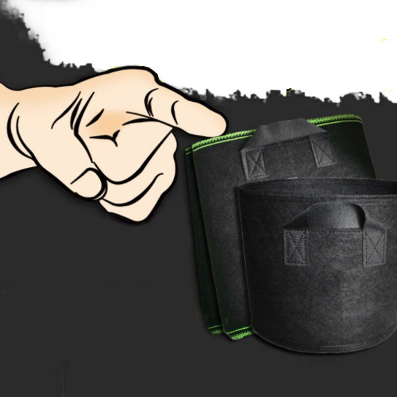 Nem szőtt faszövet edények termesztő táska gyökértartály. Fekete kéz növény ültetési virágokkal nemszőtt zacskók Növekszik kultúra