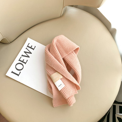 Kelių spalvų megztas vaikiškas šalikas