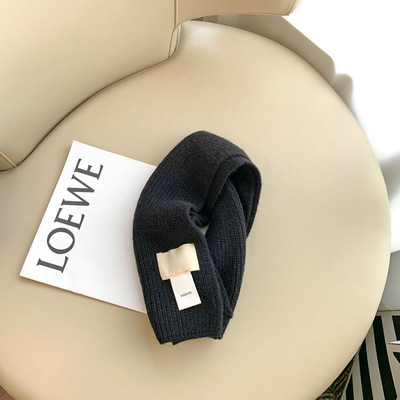 Kelių spalvų megztas vaikiškas šalikas