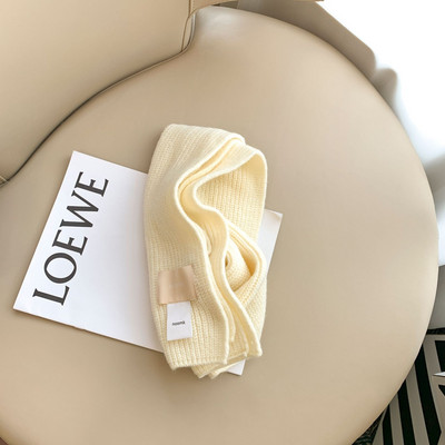 Kelių spalvų megztas vaikiškas šalikas