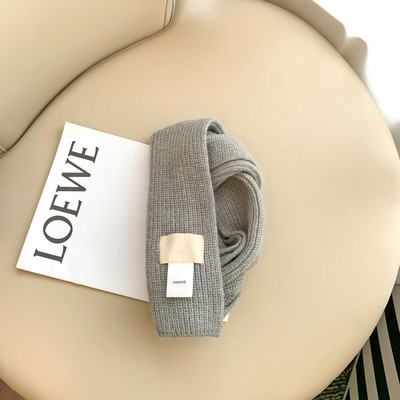 Kelių spalvų megztas vaikiškas šalikas