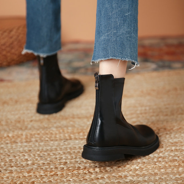 Eko bőrből készült női téli csizma lapos talppal, cipzárral