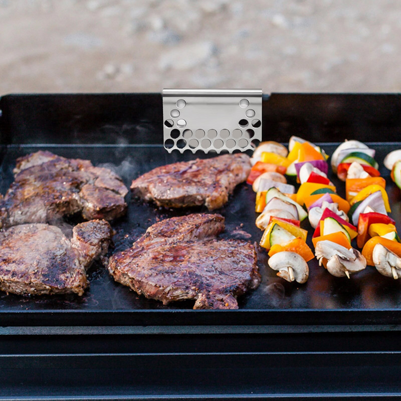 A Food Fighter hálós képernyő megakadályozza, hogy az étel a hátsó zsírfogó csésze tálcába essen, és kompatibilis az összes Blackstone Griddle-vel