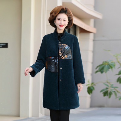 Elegantan ženski kaput sa šarenim motivima