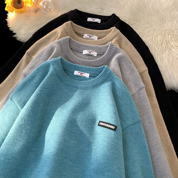 Φαρδύ πλεκτό πουλόβερ με οβάλ λαιμόκοψη