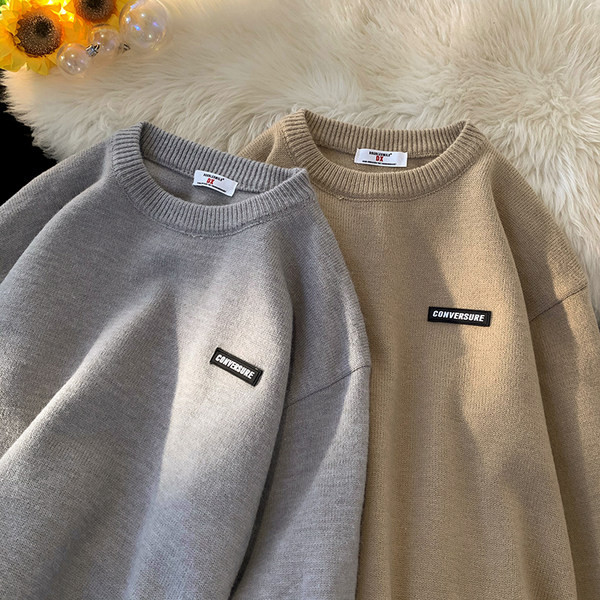 Φαρδύ πλεκτό πουλόβερ με οβάλ λαιμόκοψη