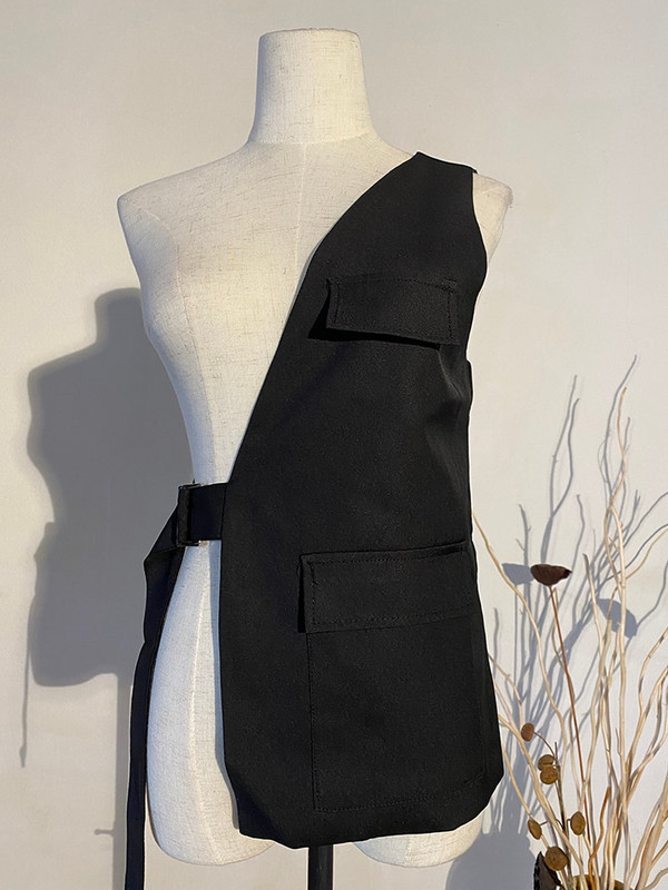 [EAM] Sieviešu brīvi pieguļoša, melna vienā pusē sprādze, sadalīta locītavas veste, jauna V veida apkakle bez piedurknēm modes plūdmaiņas, 2022. gada pavasara rudens 1Y958