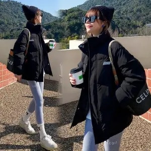 2022. gada jauns ziemas kapuci ar garām piedurknēm vienkrāsains, melns, polsterēts ar kokvilnu, silts, brīvs liela izmēra jaka Sieviešu Parkas Modes virsdrēbes