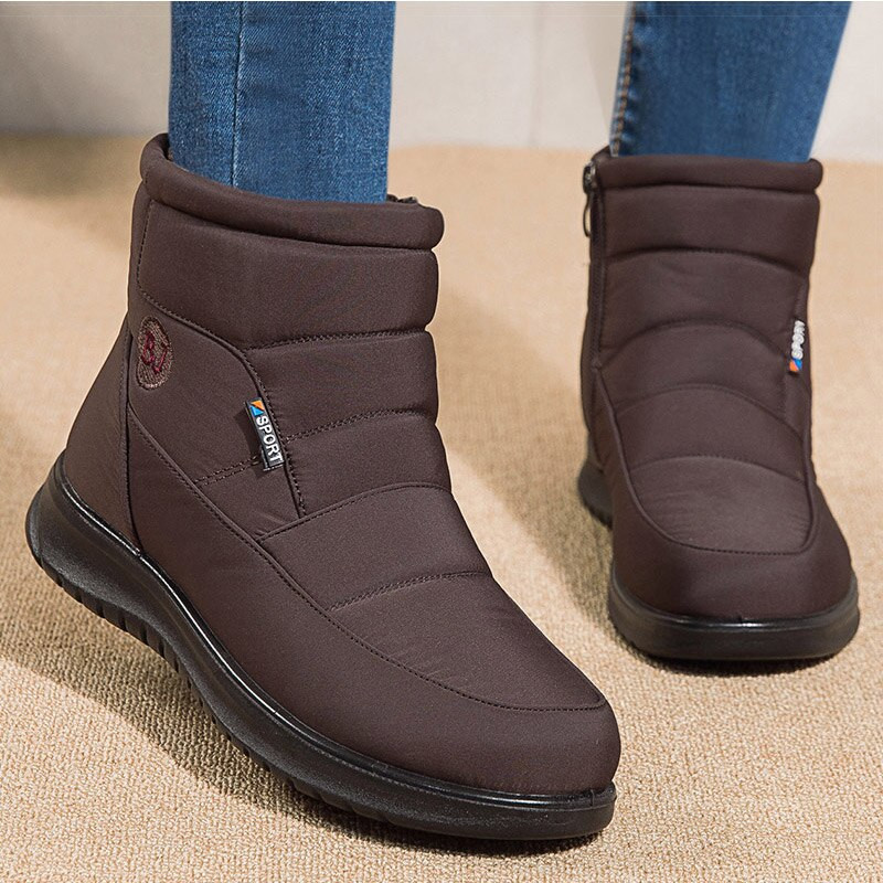 Sieviešu zābaki Sieviešu puszābaki ziemas apaviem Sieviešu 2022 Jauni silti ādas sniega zābaki Ūdensizturīgi plakani Botas Femininas Botines ar rāvējslēdzēju