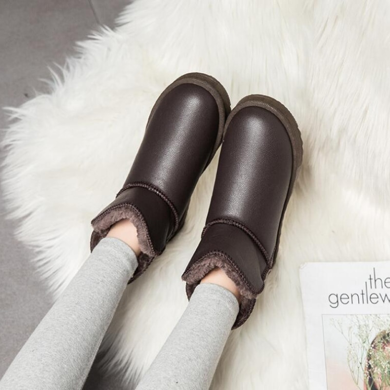 2021. gada jauni Winter Plus Velvet PU ūdensnecaurlaidīgi sniega zābaki ar vidējo cauruli, biezināti silti sieviešu zābaki 35–40 kokvilnas apavi ar plakaniem papēžiem