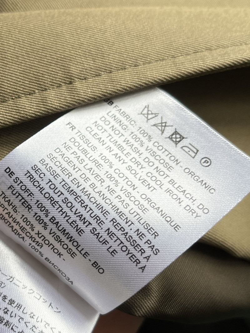 Sieviešu vidēja garuma mētelis, kokvilnas divrindu britu stila, kaklasaites un jostas, sieviešu vējjaka