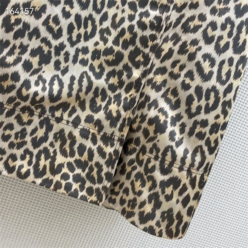 2022. gada pavasara jauna divrindu vidukļa jostas dizaina leoparda raksta vējjaka ar kapuci liela zīmola sieviešu modes vidēja garuma jaka