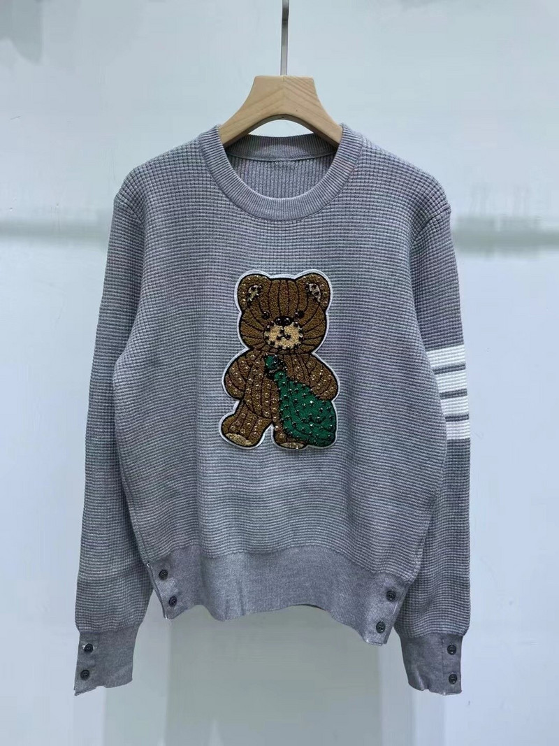 TB THOM karikatūras raksts, kas samazina vecumu