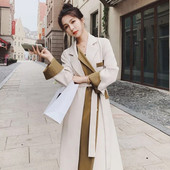 2022. gada rudens elegants sieviešu krāsai pieskaņots garš vējjaka augstas klases mētelis Britu divrindu, tievs jostas mētelis