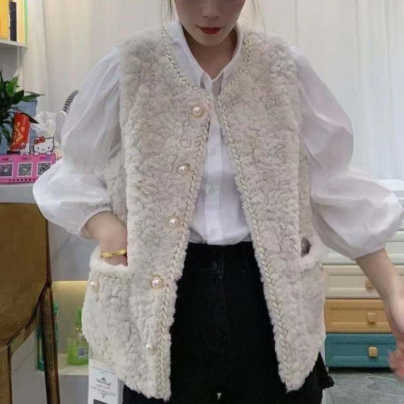 Ziemas veste sieviešu retro stila biezi, silti jēra gaļas topi korejiešu stila eleganti dāmu temperamenta pogām bez piedurknēm.