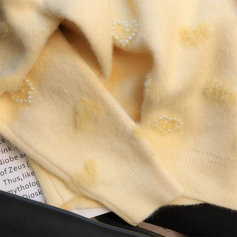 Kremasto žuta niša nježnog stila flocking ljubavni džemper ženski jesenski i zimski opušteni niche chic mekani voštani džemper