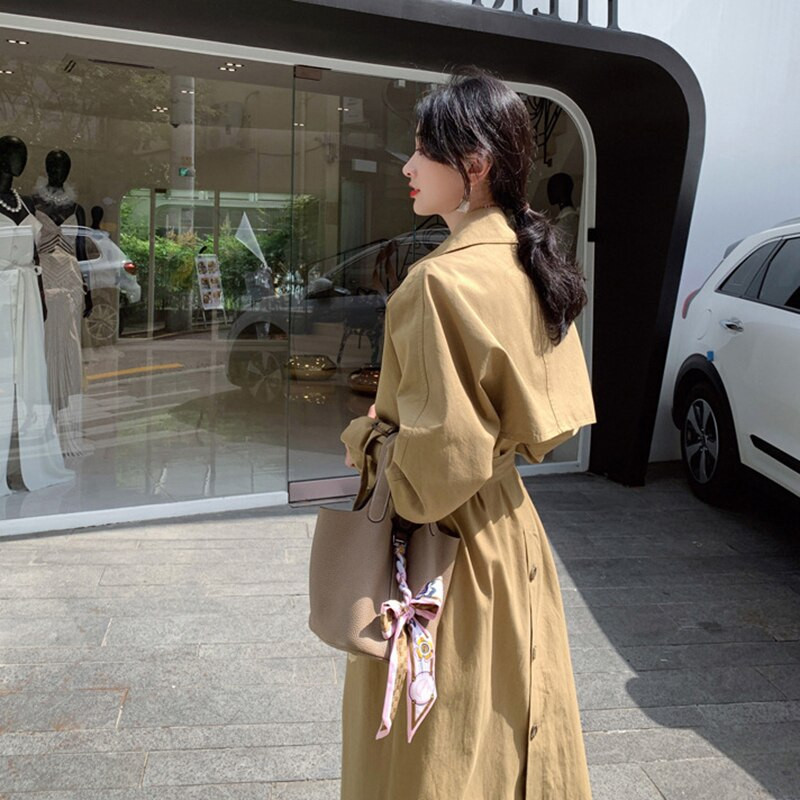 Vjetrovka Ženska duga jednobojna britanska uska jakna s remenom 2022. Nova modna proljetna odjeća za slobodno vrijeme Ženski jesenski baloner